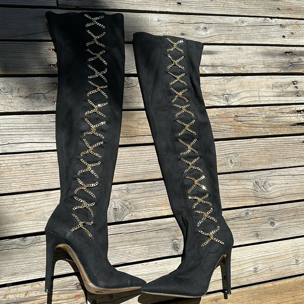 Jennifer Lopez Knee high boot heels